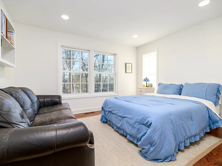 Second guest bedroom adjacent to the other guest room on the first floor