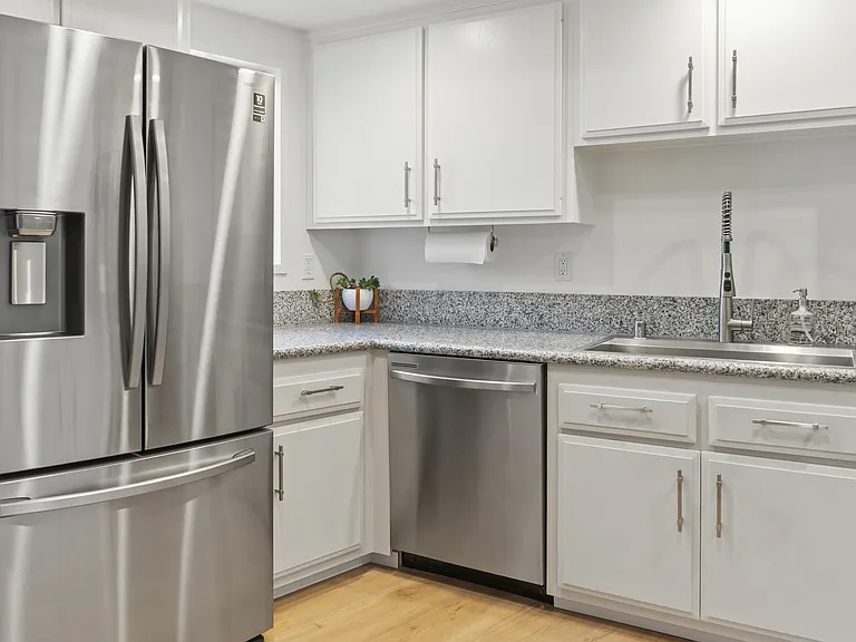 Large gourmet kitchen with refrigerator