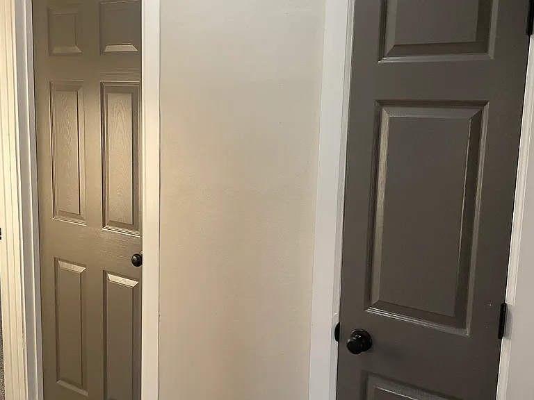 Hallway between bedrooms and bathroom