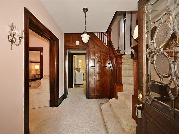 Check out the beautiful original woodwork and architectural details!