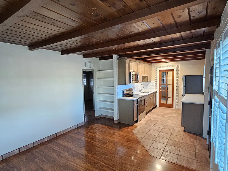 Living/Dining space with door out to front