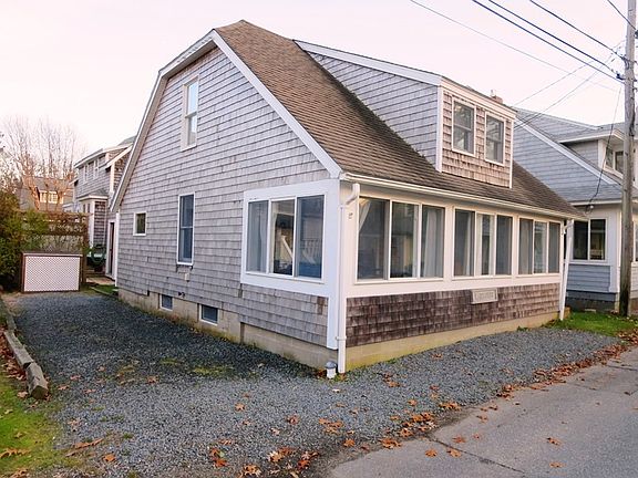 Driveway along side of home