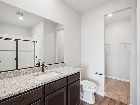Master bathroom with a walk-in shower.