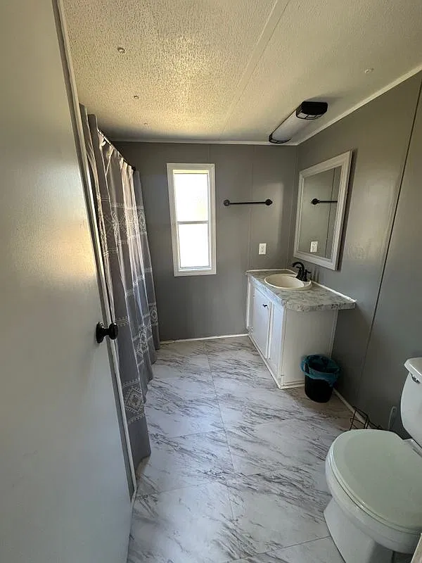 3 bed, 1.5 bath, 1000 sqft, $1,000 — Photo 3