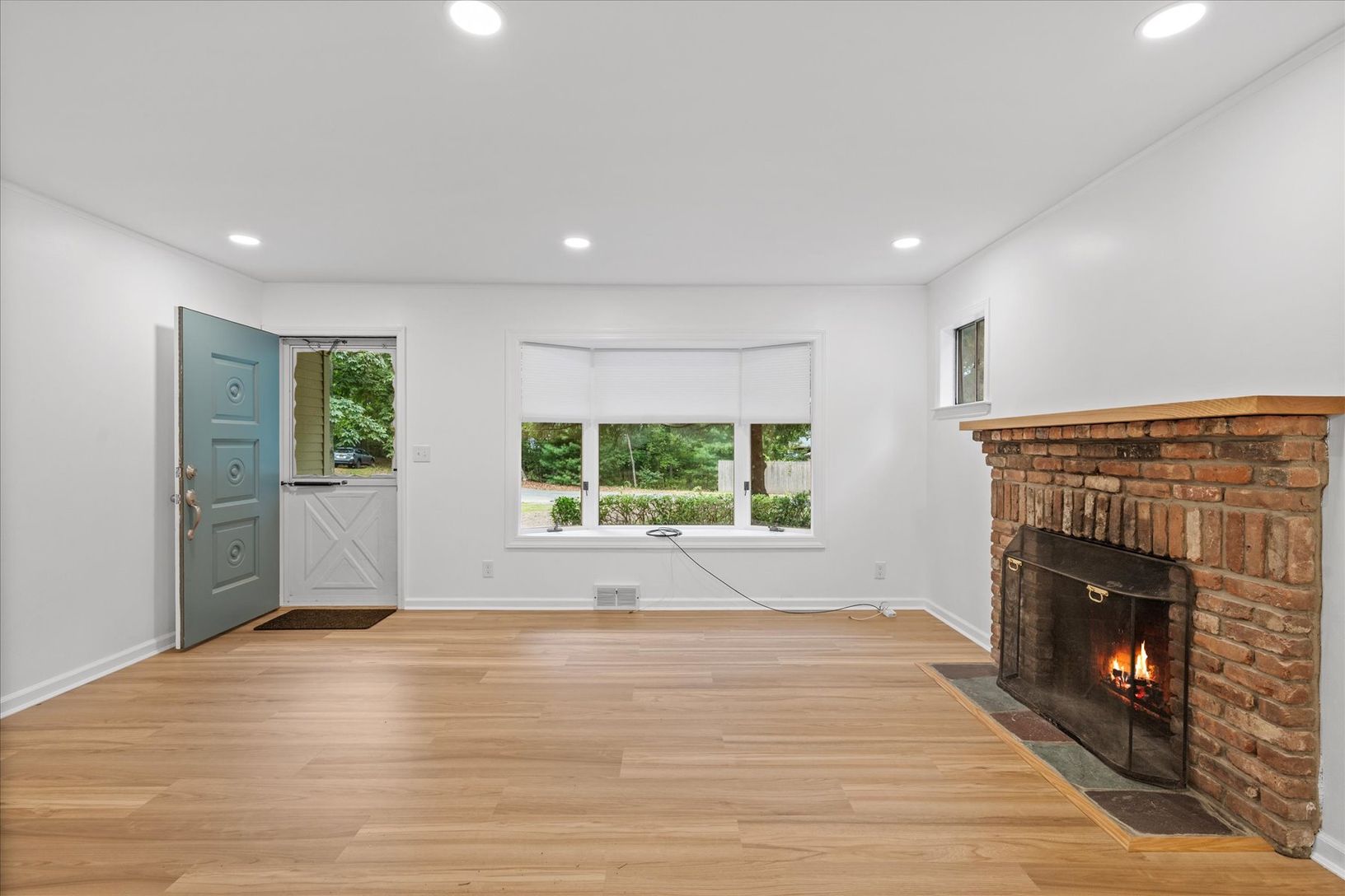  Living Room with wood burning Fireplace