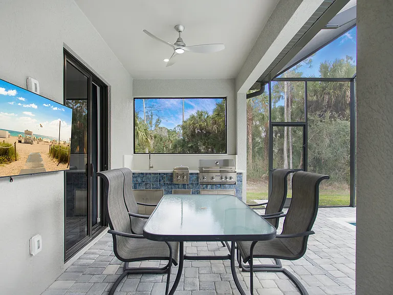 outdoor kitchen with sink, built-in burners and BBQ