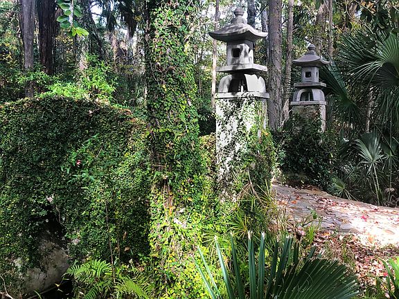 The stone bridge to the house from Riverside Drive