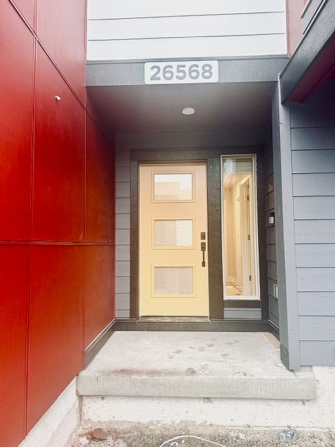 Follow the walkway to the front door