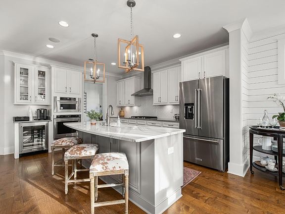 Well-equipped kitchen with breakfast bar and ample countertop and cabinet space