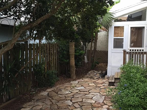 private flagstone courtyard in front