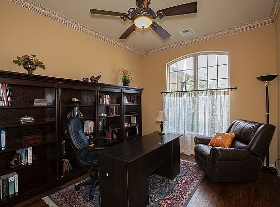 Home office at entry with large closet.