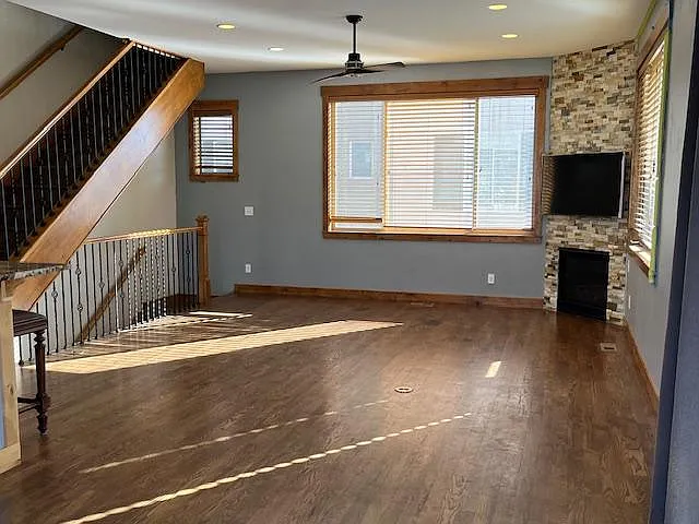 Living room open floor plan and new fireplace stone tile - 2290 W 31st Ave