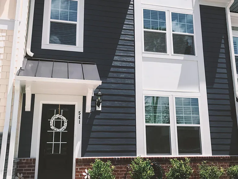 Front of the townhome. Just steps away from El Hombre, The Cardinal, Strike and Barrel, and a local book store. Not to mention the best coffee in Wake Forest, Black and White.