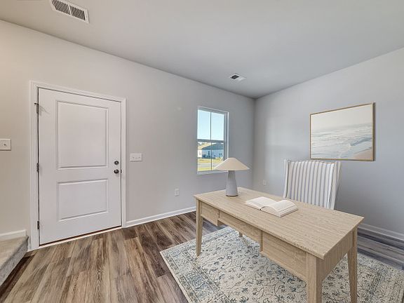 Flexible space at the front of the home is perfect for a home office.