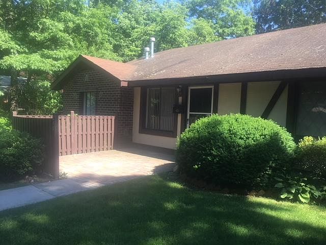 (Note, brick/fenced patio)