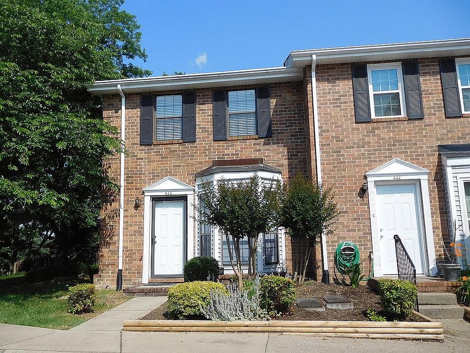 Adorable front entrance with landscaping.