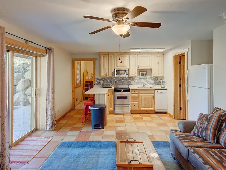 Garden-level living room right off of kitchen