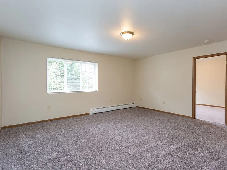 Carpeted Bedroom with Window