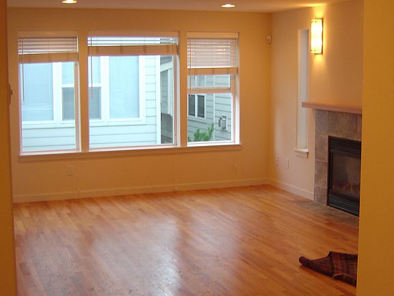 hardwood floors, gas fireplace, dining room and kitchen on 1