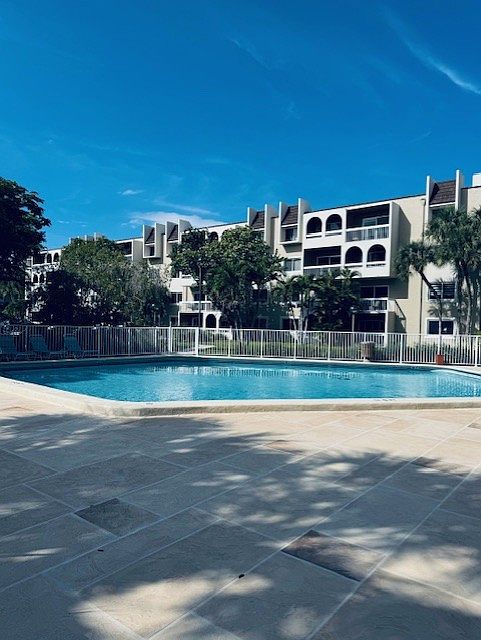outside property with one of the pools. view from balcony