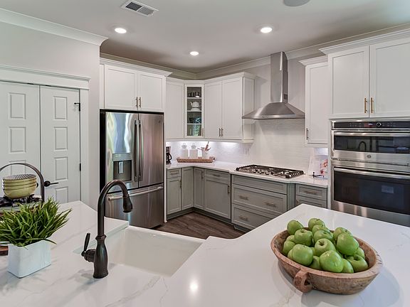 These photos are representative of this floor plan, but all options may not be available in every co