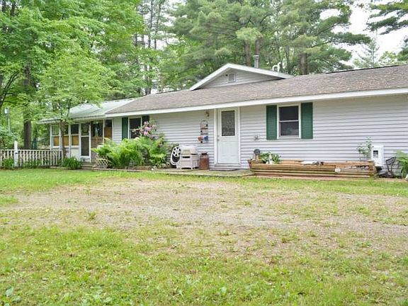 Side entrance of home next to driveway.