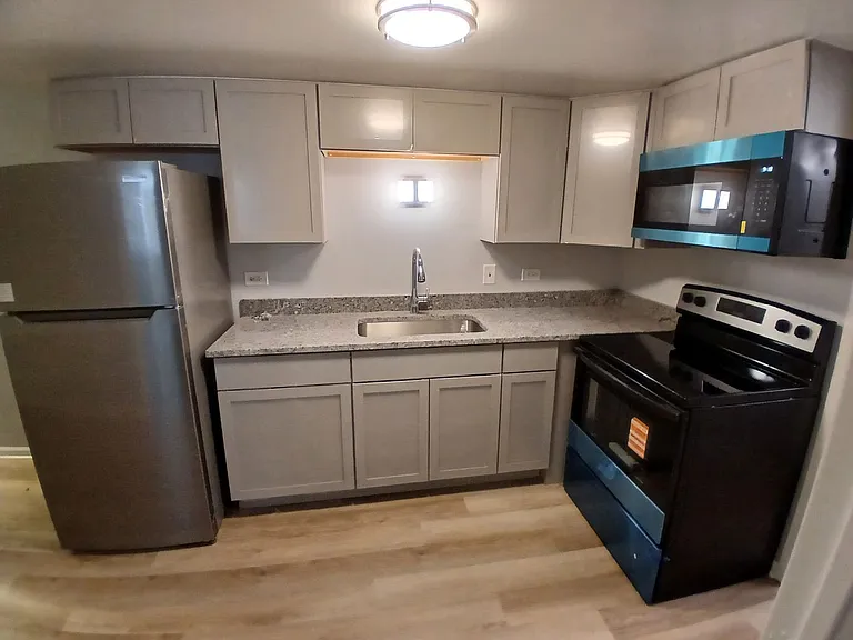7631 W 63rd Pl — Photo 3