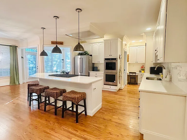 Chef's kitchen with gas stove top, double oven, and stainless steel Kitchen Aid appliances!