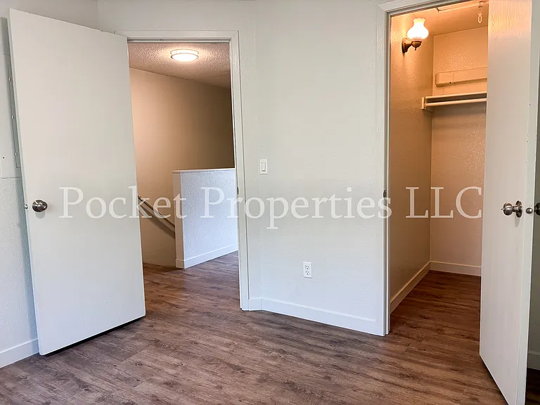 Second upstairs bedroom and walk-in closet