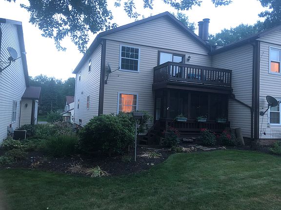 Back view of condo and porch