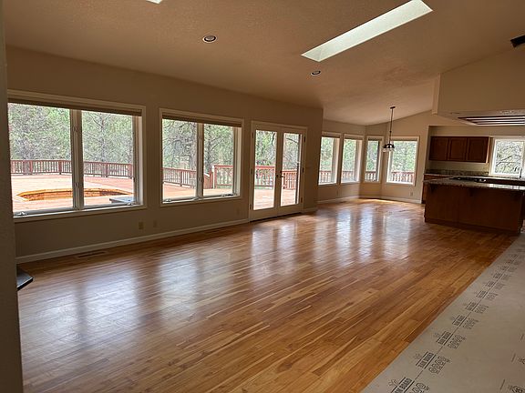 Main living area. Please disregard the paint runner.