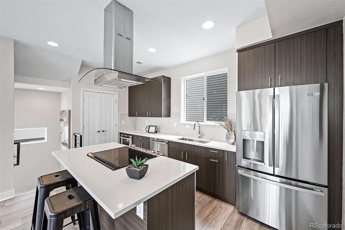 Kitchen rendering by the builder with beautiful finishes. - 4925 N Lowell Blvd #4