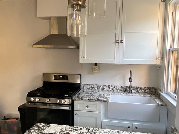 Brand New Kitchen featuring Farmhouse Sink, Granite Counters. Great for Cooking & Gathering!