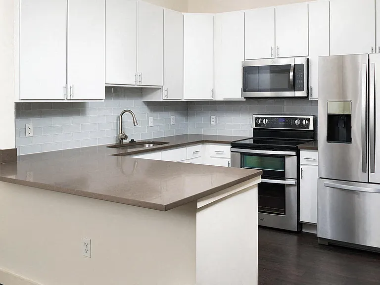 Cook in style with a kitchen featuring beautifully renovated finishes throughout.