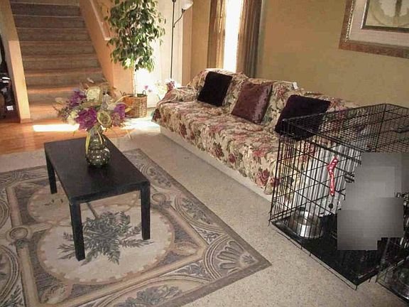 Spacious Living Room & Staircase