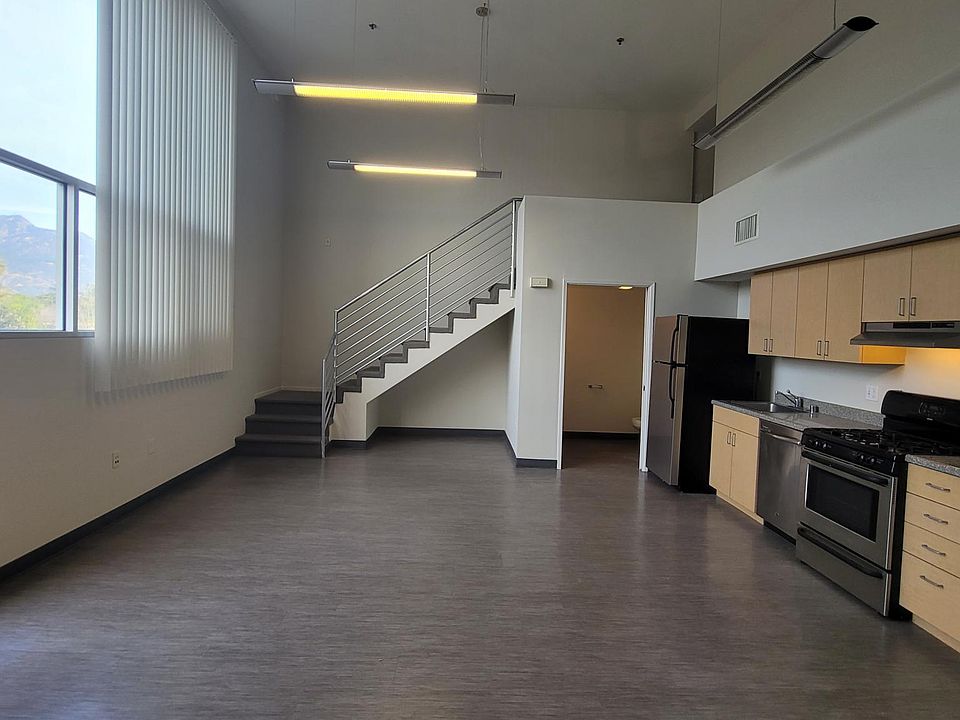 Living space, kitchen, half bathroom downstairs