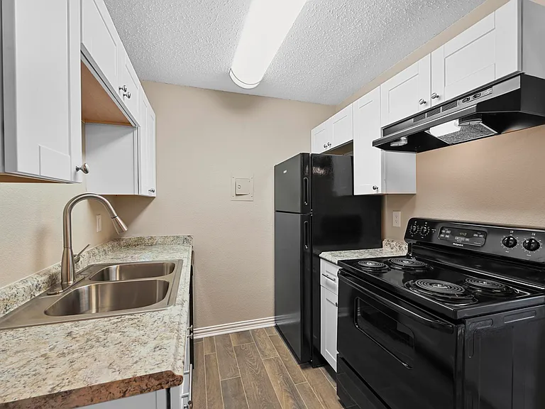 Updated kitchen with black appliances