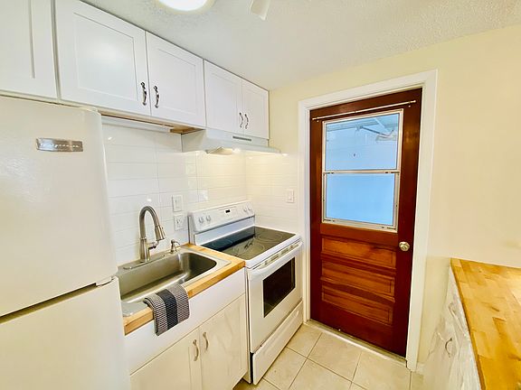 Access from kitchen to garage.