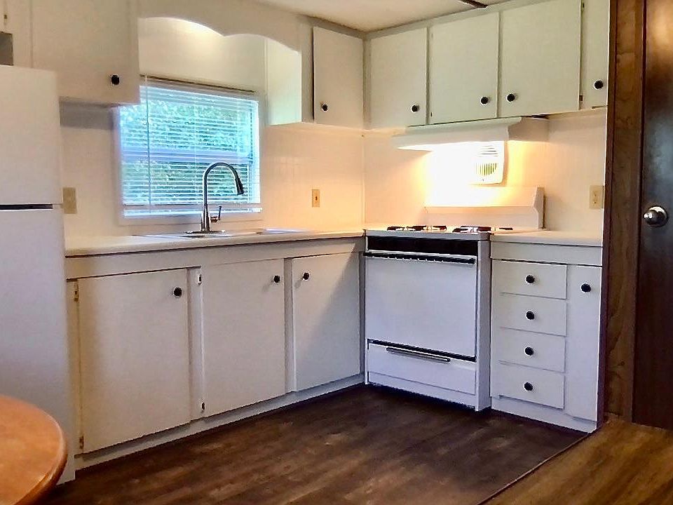 Kitchen with small pantry.