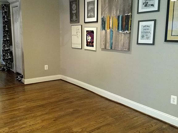 Living Room (and hallway leading past kitchen and bathroom to bedroom)