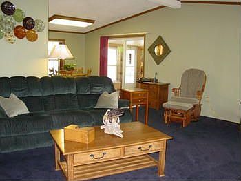 The living room is open and has plenty of space.