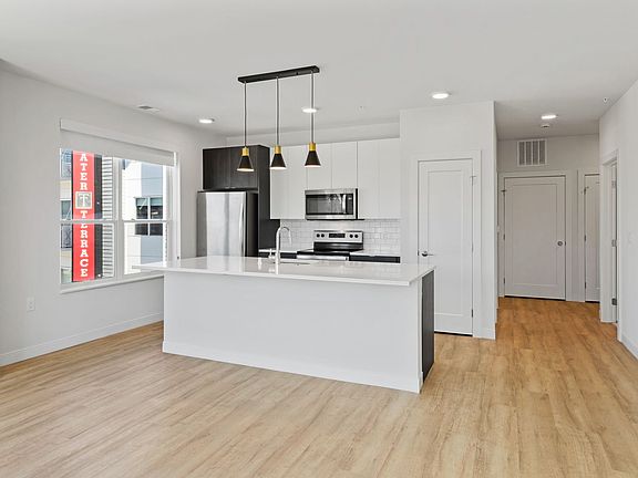 4th image of 5945 6th Ave #407
