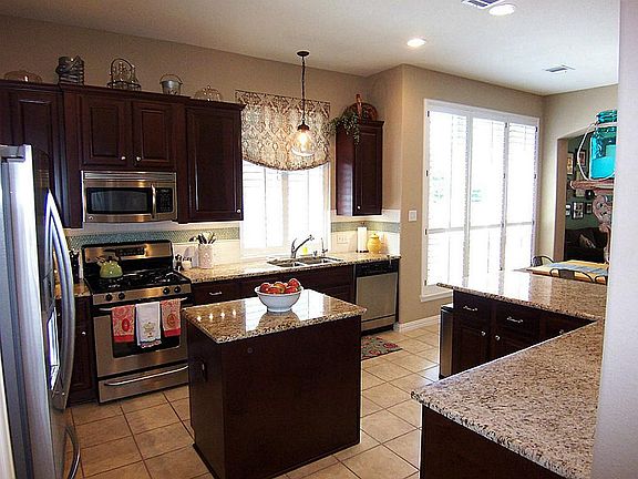 Gorgeous Kitchen with Granite Countertops and Stainless Steel Appliances.