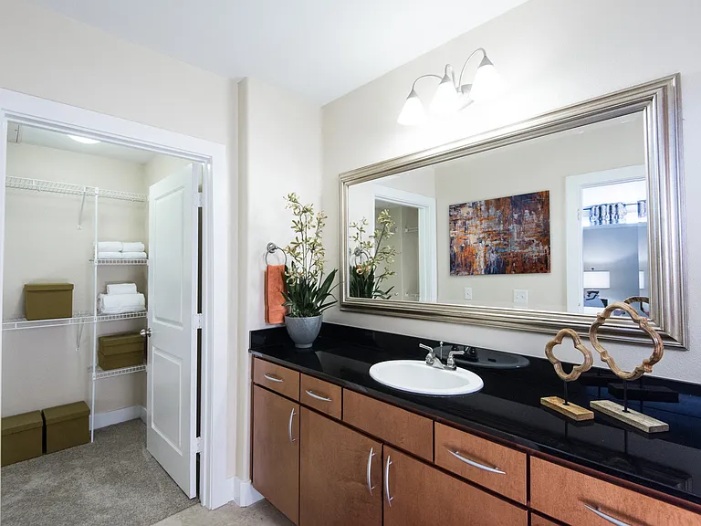 Upgraded baths with granite countertops and framed mirrors