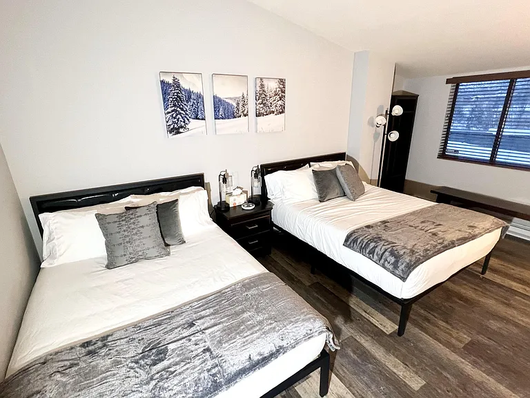 Bedroom 2: 2 Queen Beds, 55 in LED TV, Arcade (2nd floor)