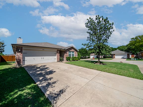 2 car garage with big driveway