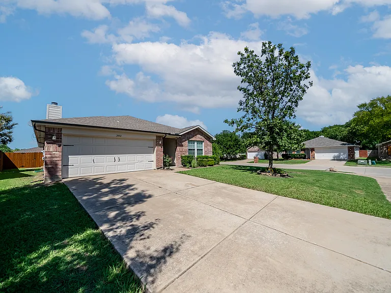 2 car garage with big driveway