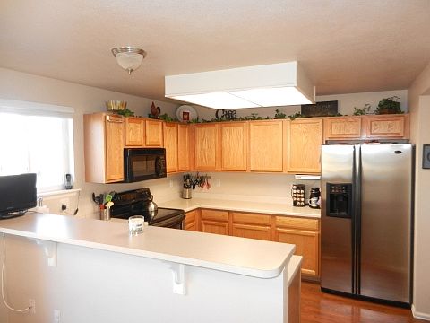 Large pantry stainless appliances w walkout to deck