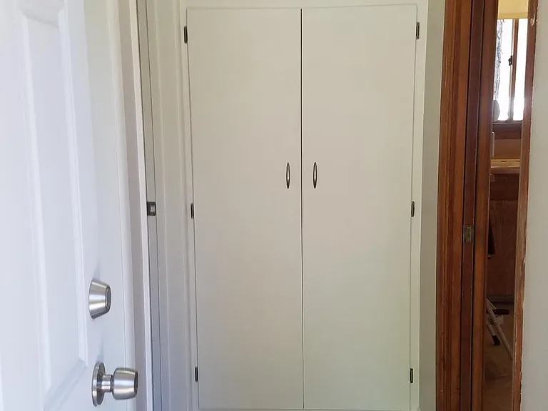 linens and storage closet located in hallway