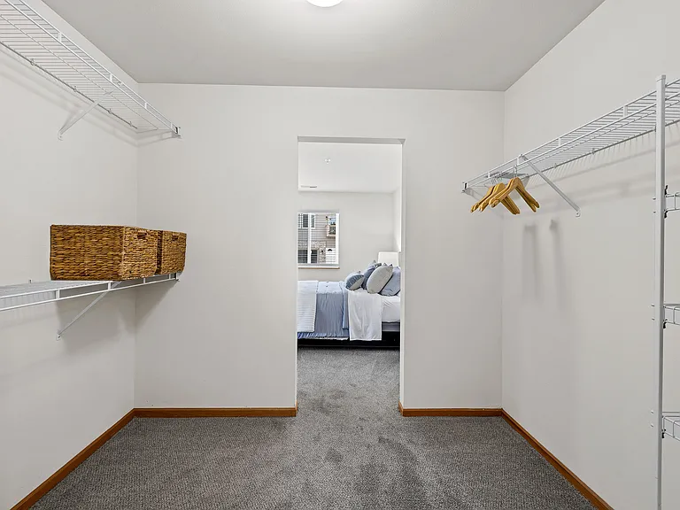 Saddlebrook Apartments Primary Bedroom Walk-In Closet